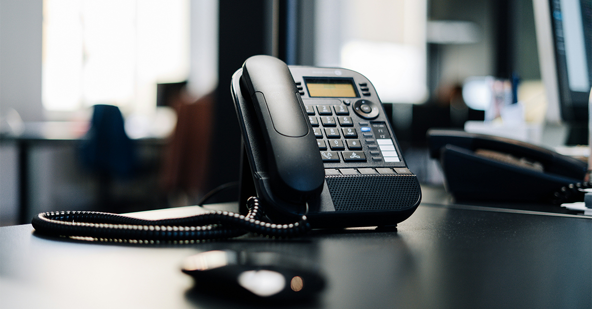 telephone on a desk in an office
