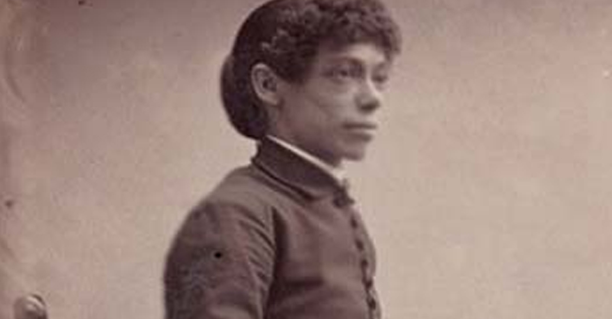 Portrait of Fanny Mills, showcasing her famous legs.