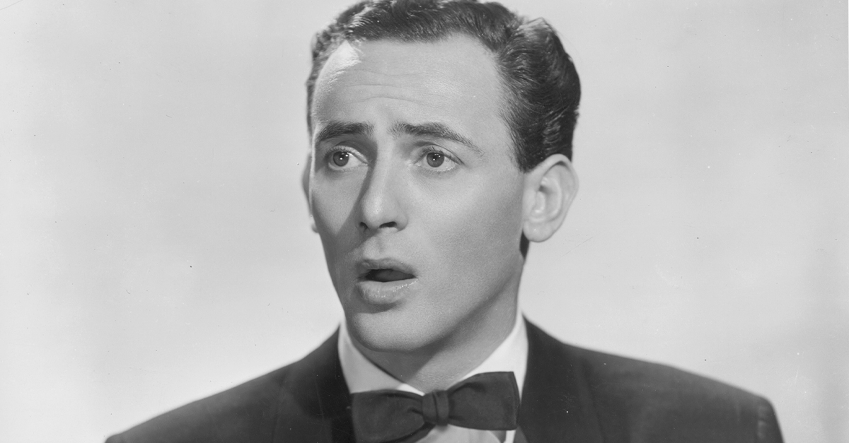 Young Joey Bishop looking shocked, dressed in formal wear