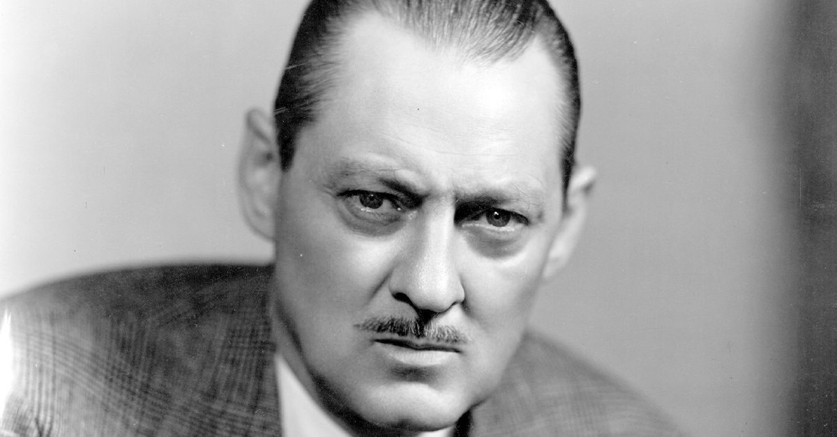 Portrait of Lionel Barrymore, looking serious and making eye contact