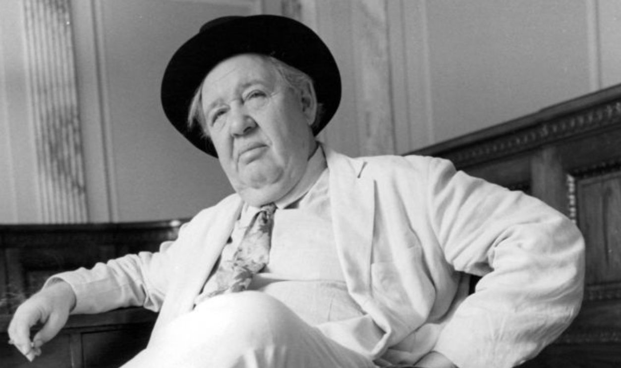 Charles Laughton sitting in chair in a scene from the film 'Advise & Consent', 1962.